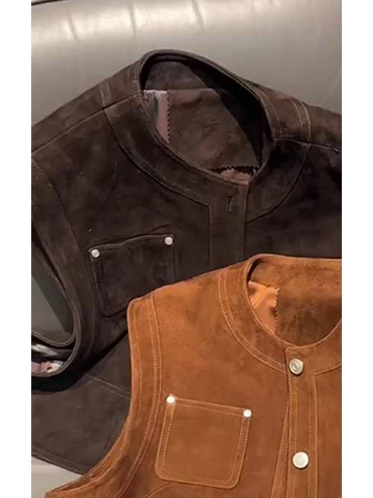 Black and gray vests